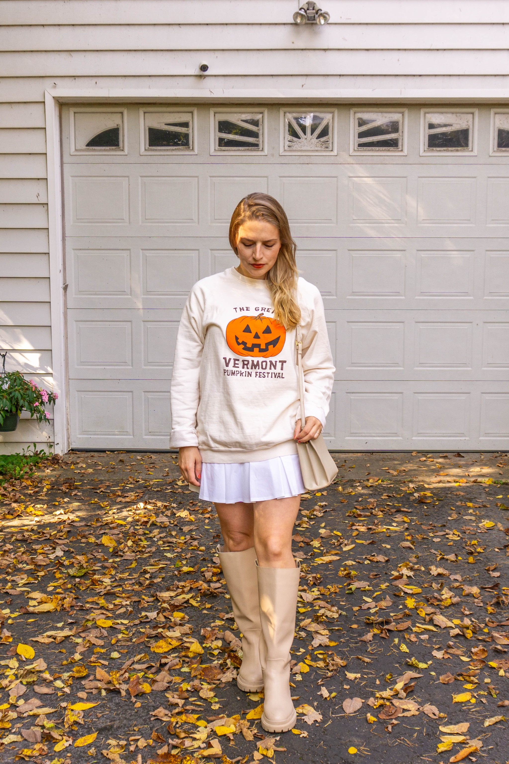 Preppy casual fall ootd. Wearing a size large in the sweatshirt for an oversized look. Boots and tennis skirt fit true to size 🍂

#LTKHalloween #LTKfindsunder100 #LTKSeasonal