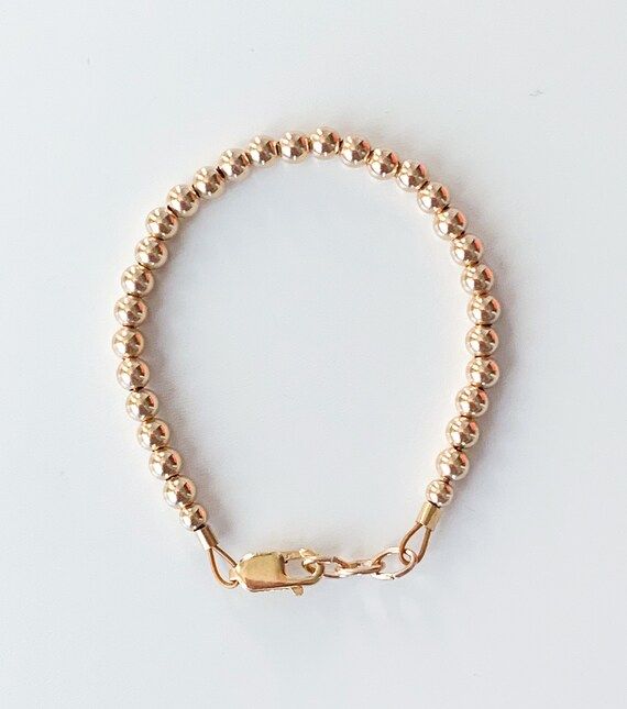 GOLDIE - beaded baby bracelet, gold filled | Etsy (US)