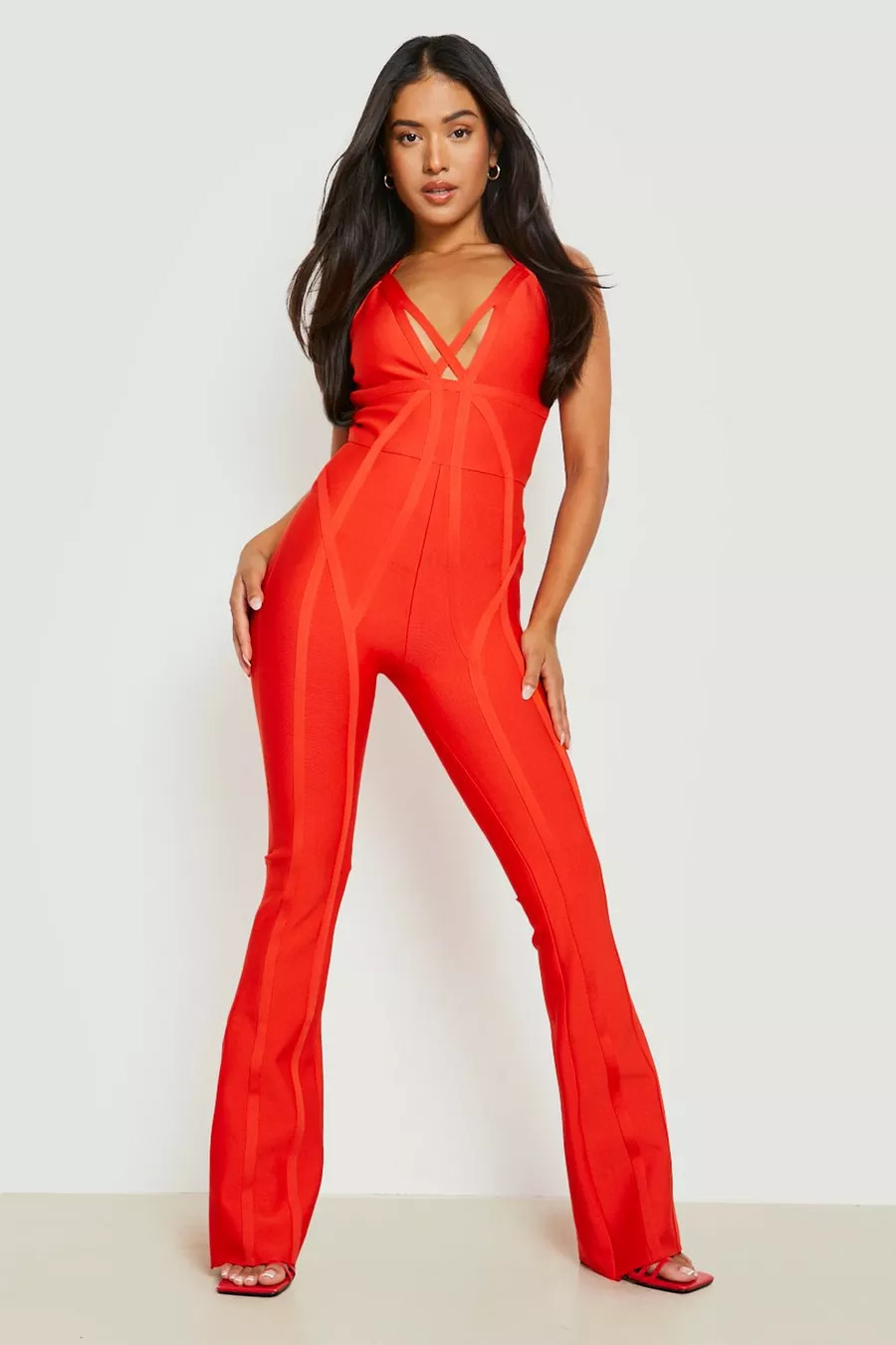 Petite Bandage Strappy Plunge Flare Jumpsuit | Boohoo.com (US & CA)