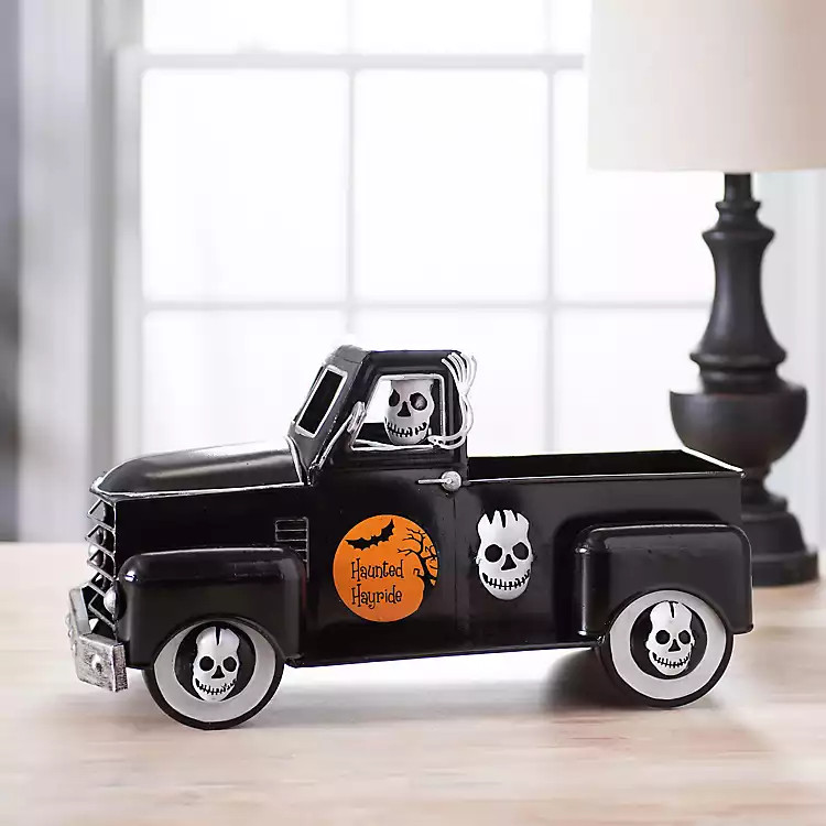 New!
											Skeleton Man and Truck Figurine | Kirkland's Home