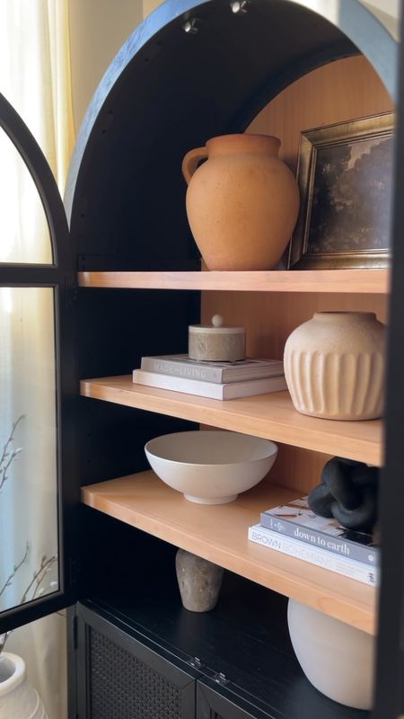 Home decor, arched cabinet, black cabinet, bookshelf, home decor book, coffee table book, vase, target, organic decor, organic modern, art, bowl

#LTKhome #LTKstyletip