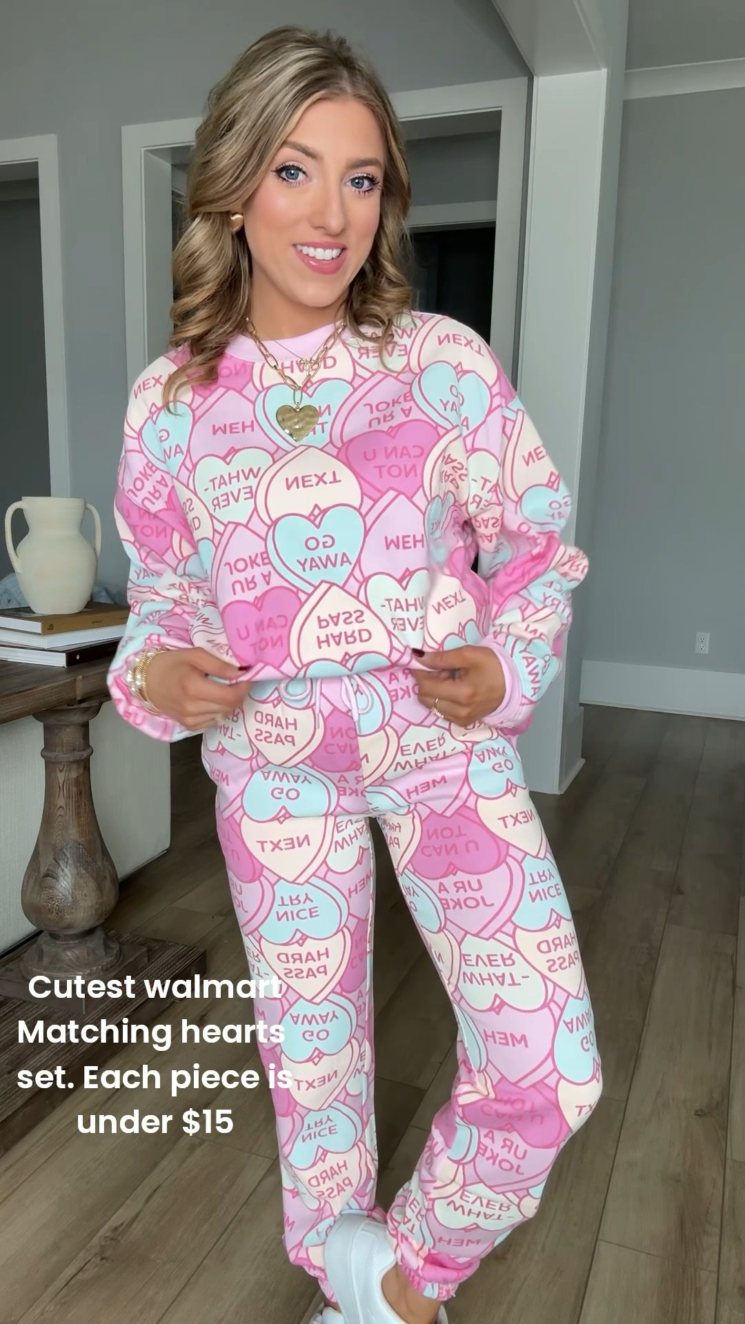 If you love comfy sets with a fun, festive twist… this Walmart conversation hearts matching set is a MUST 🤍🍬

Both pieces are under $15 each, making this one of the cutest (and most affordable) Walmart loungewear sets I’ve found. The sweatshirt is soft and cozy with a relaxed fit, while the joggers have an easy elastic waistband that’s perfect for all-day comfort. The conversation heart print is giving major Valentine’s Day vibes but is still cute enough to wear all season long.

This is the perfect Valentine’s Day outfit, Galentine’s look, or cozy day at home set. Style it together or mix and match with your favorite basics for endless outfit options. Affordable, playful, and SO good.

✨ Linked in LTK for easy shopping ✨

#WalmartFashion #WalmartFinds #WalmartMatchingSet #WalmartLoungewear #AffordableFashion #ValentinesDayOutfit #ConversationHearts #Under15Finds #BudgetStyle #ComfyStyle #CuteAndCozy #WalmartStyle #LTKFinds #LTKUnder15