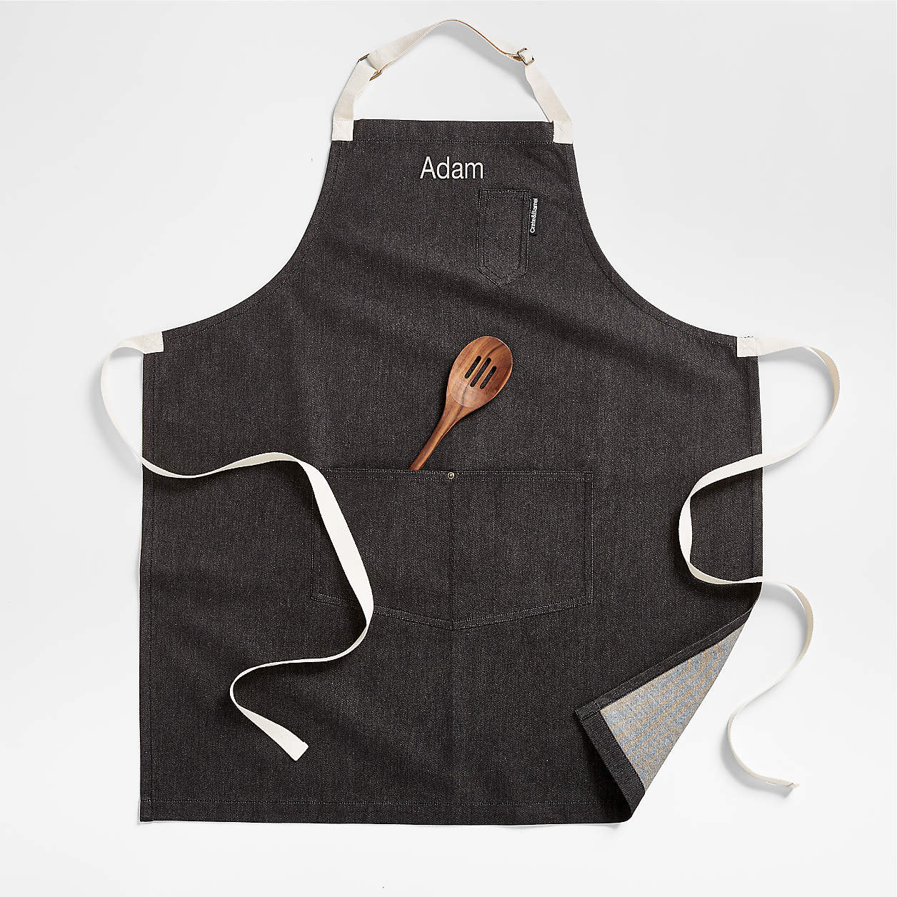 Black Organic Cotton Kitchen Apron with Pockets + Reviews | Crate & Barrel | Crate & Barrel