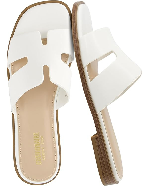 Amazon.com | CUSHIONAIRE Voyage Cutout Strap Slides for Women, Slip On Summer Flats, Trendy Footw... | Amazon (US)