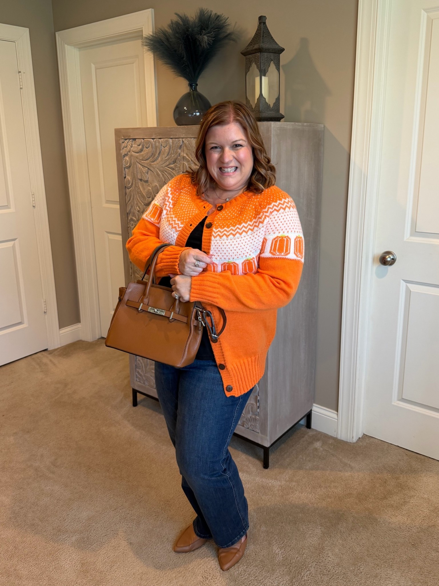Happy October! ✨🎃 This orange pumpkin sweater is a fun way to start out the season!!

#LTKMidsize #LTKOver40 #LTKSeasonal