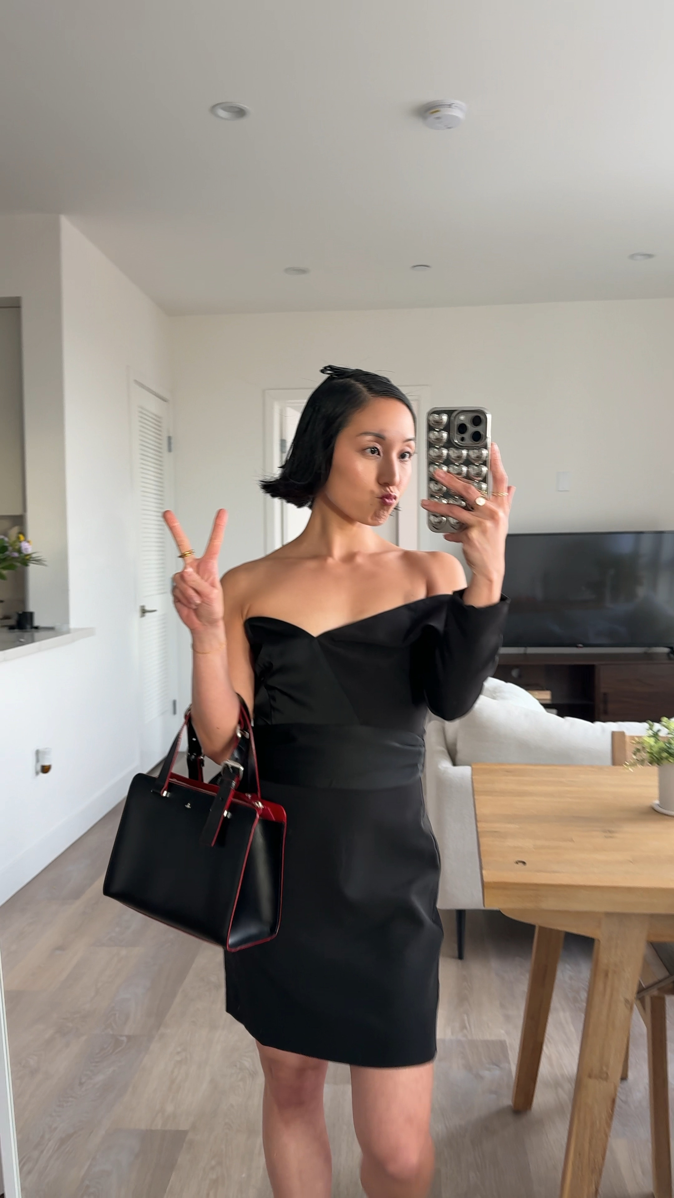 the perfect black cocktail dress for a night out with friends or date night! i am 4'11" and wearing an XS. very roomy in the bust for smaller chested girls, so pick your size according to bust would be my best advice! 

#LTKshoecrush #LTKstyletip #LTKVideo