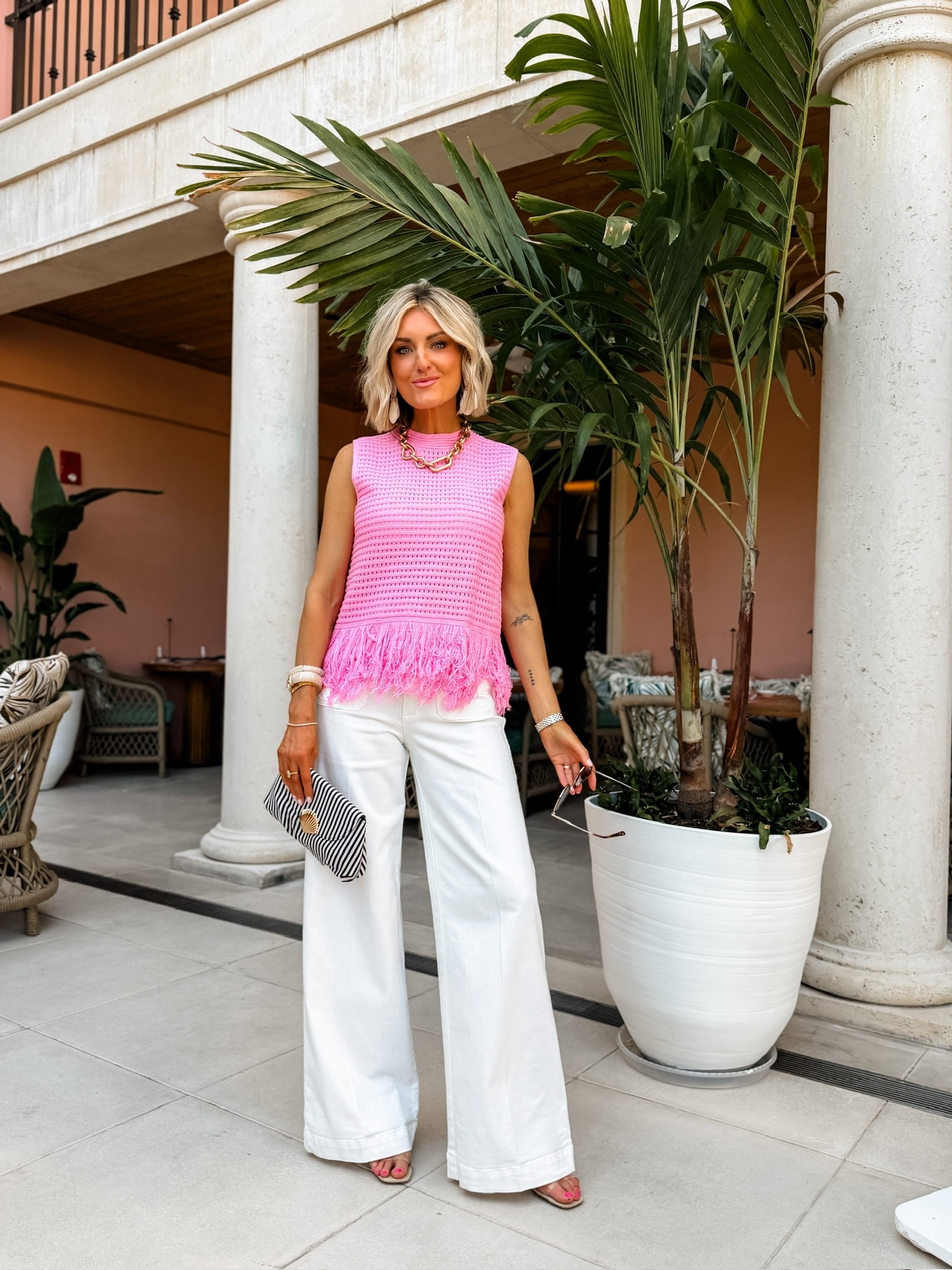 This statement top from Amazon! 😍 Love the feather details on the ends! I also got this top in white! Wearing S/2!

Loverly Grey, Palm beach, vacation looks, girls night out, resort wear, Amazon, white denim 

#LTKSeasonal