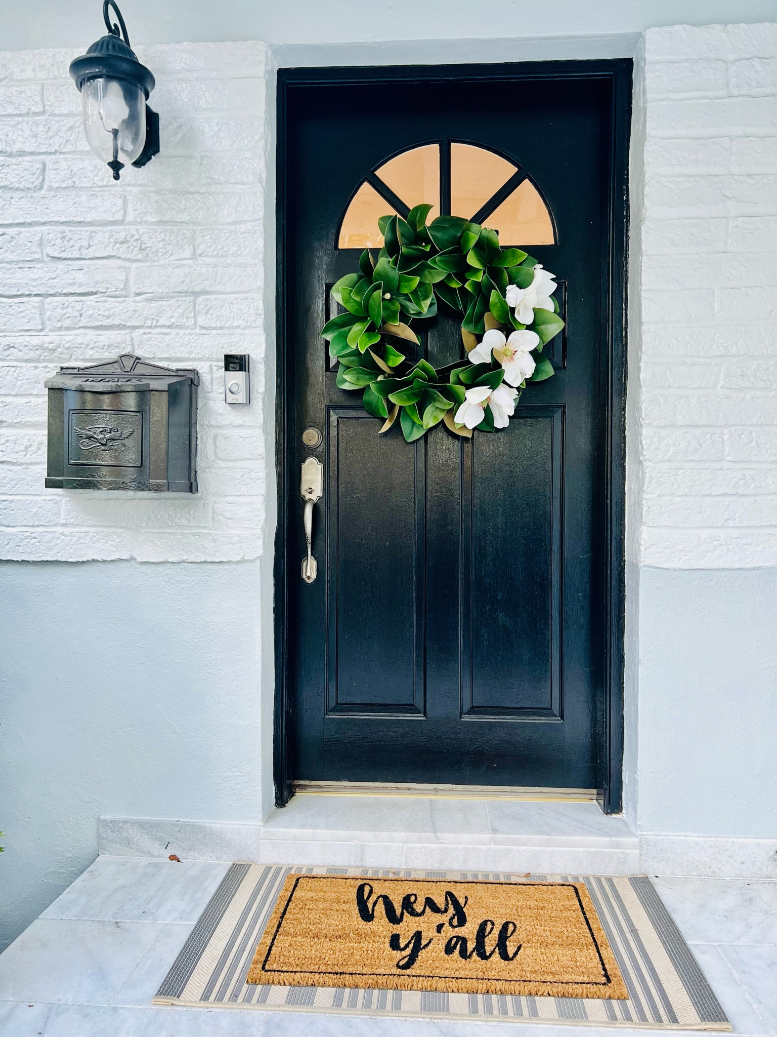 Spring wreath 
Front door mat 
Faux magnolia wreath 

#LTKSeasonal #LTKhome