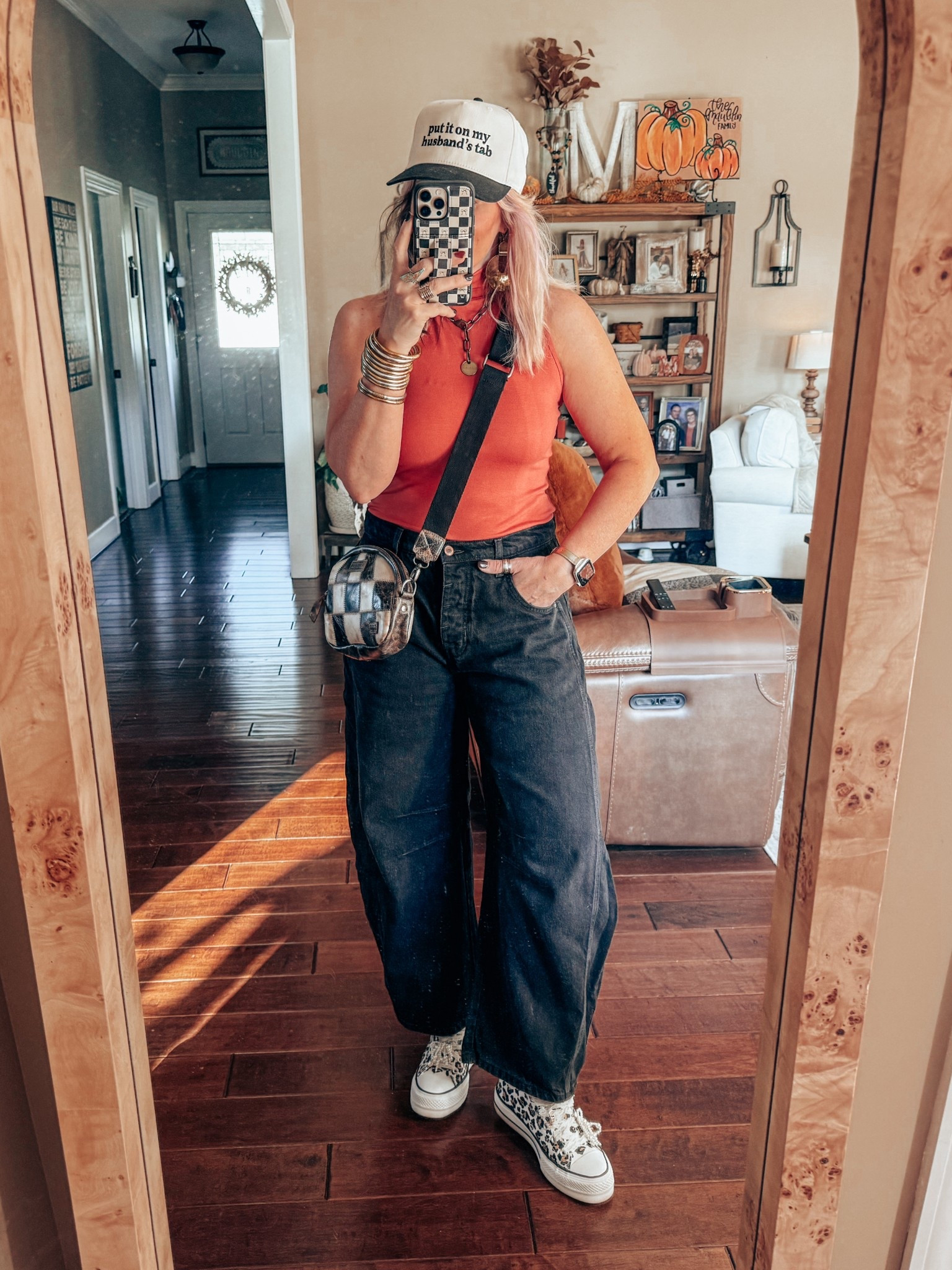 It’s October…my fav time of the year! I had to wear a little orange and black today! 
Mock neck top - M
Black Barrel jeans - true to size 
Converse - I size down 
✨Earrings and necklace is @twistedsilver save with code MANDIE20 

#LTKStyleTip #LTKFindsUnder100 #LTKOver40