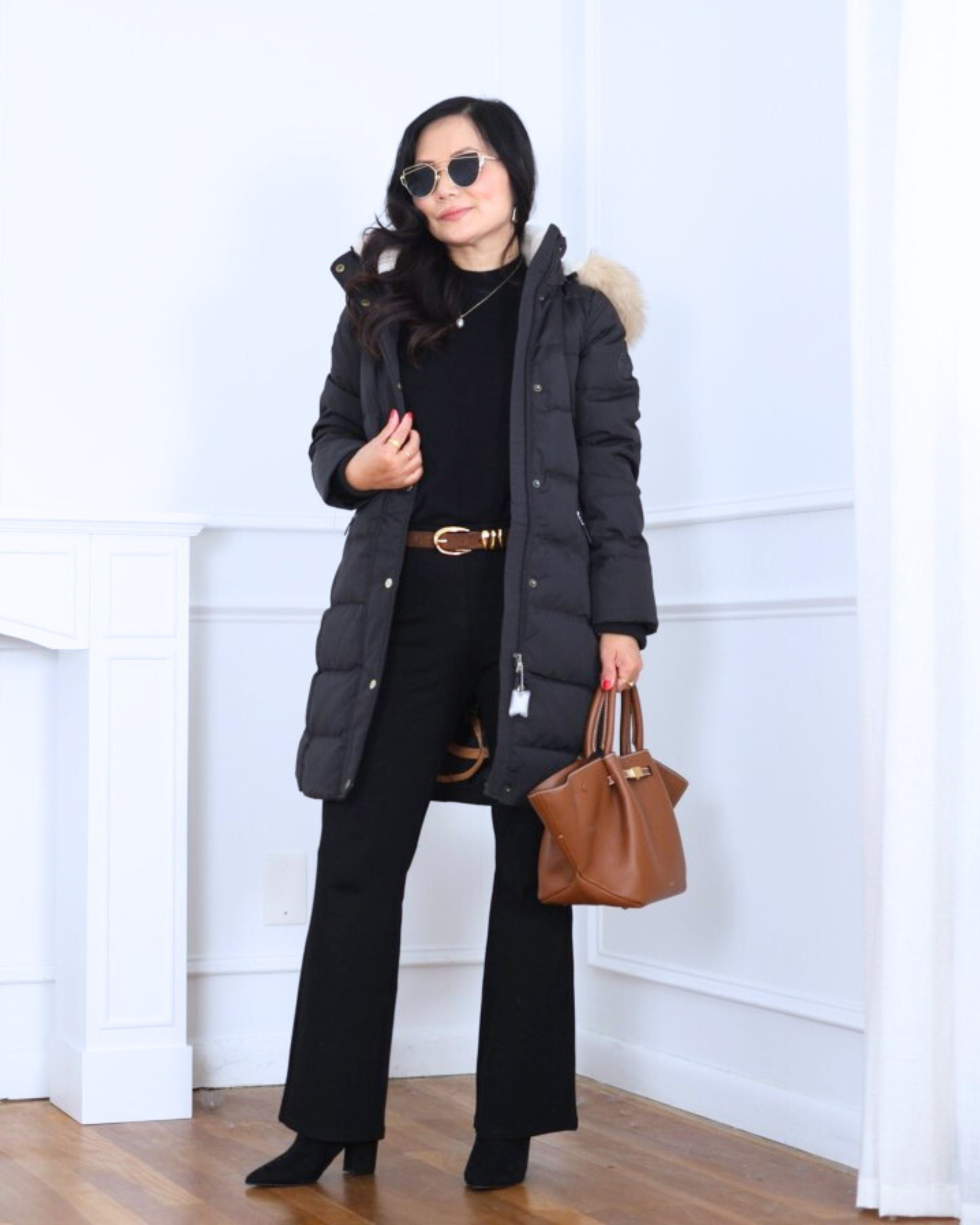 Warm and chic — this hooded faux fur puffer from Lauren by Ralph Lauren paired with bootcut pants from Quince and black booties is perfect for staying cozy while looking effortlessly polished all season long. I’m 5’2, wearing size XS.

#LTKPetite #LTKootd #LTKOver40