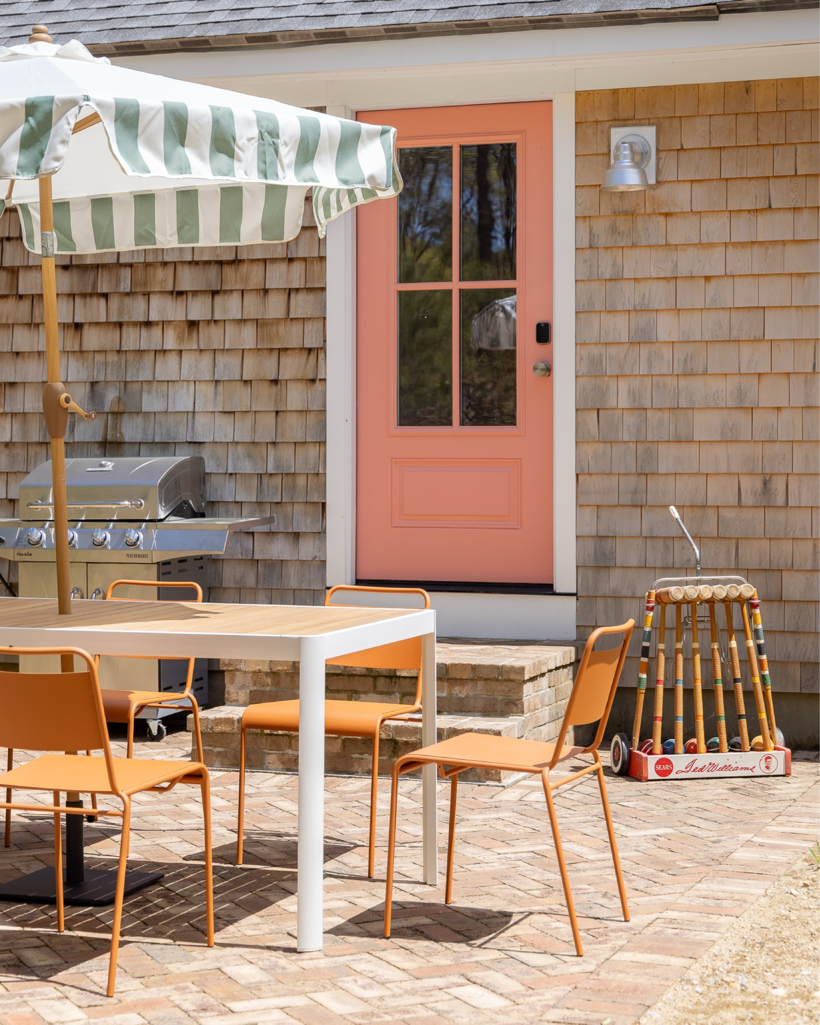 it may be cold and snowy out here in New England, but we are dreaming of warm summer days spent at the #preppyhollowhouse, enjoying a classic Cape Cod summer. when updating the exterior, we removed the small deck on the back of the house and replaced it with a brick patio perfect for outdoor dining and grilling. we also switched out the existing sliding glass door for a regular exterior door, which allowed us to gain a bit more storage space in the kitchen. the private backyard offers plenty of space for outdoor games. #dwelloctoberstay #dwelloctober

#LTKHome