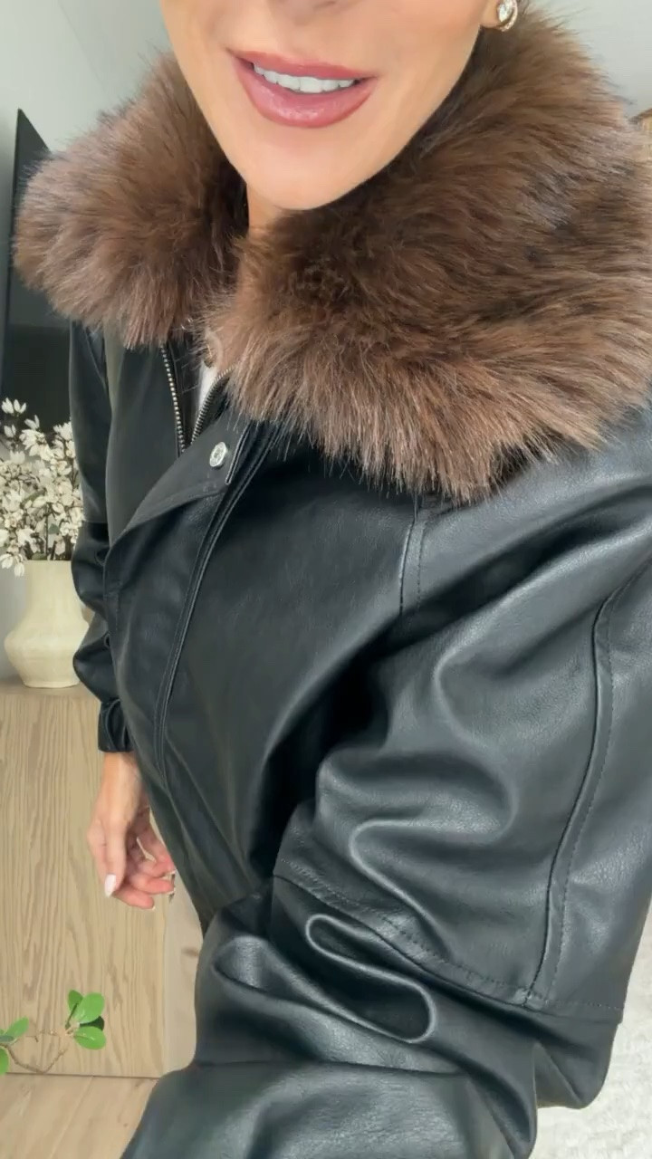 This jacket had me at the faux fur collar. I love the contrast against the black leather and the slightly relaxed shape. Such a good statement layer with trousers or denim for fall.

faux fur collar jacket, black leather jacket, fur trim jacket, fall jacket, statement jacket, black outerwear, fall layering, leather bomber jacket, fall outfit, women’s outerwear, women over 40 fashion, annabrstyle