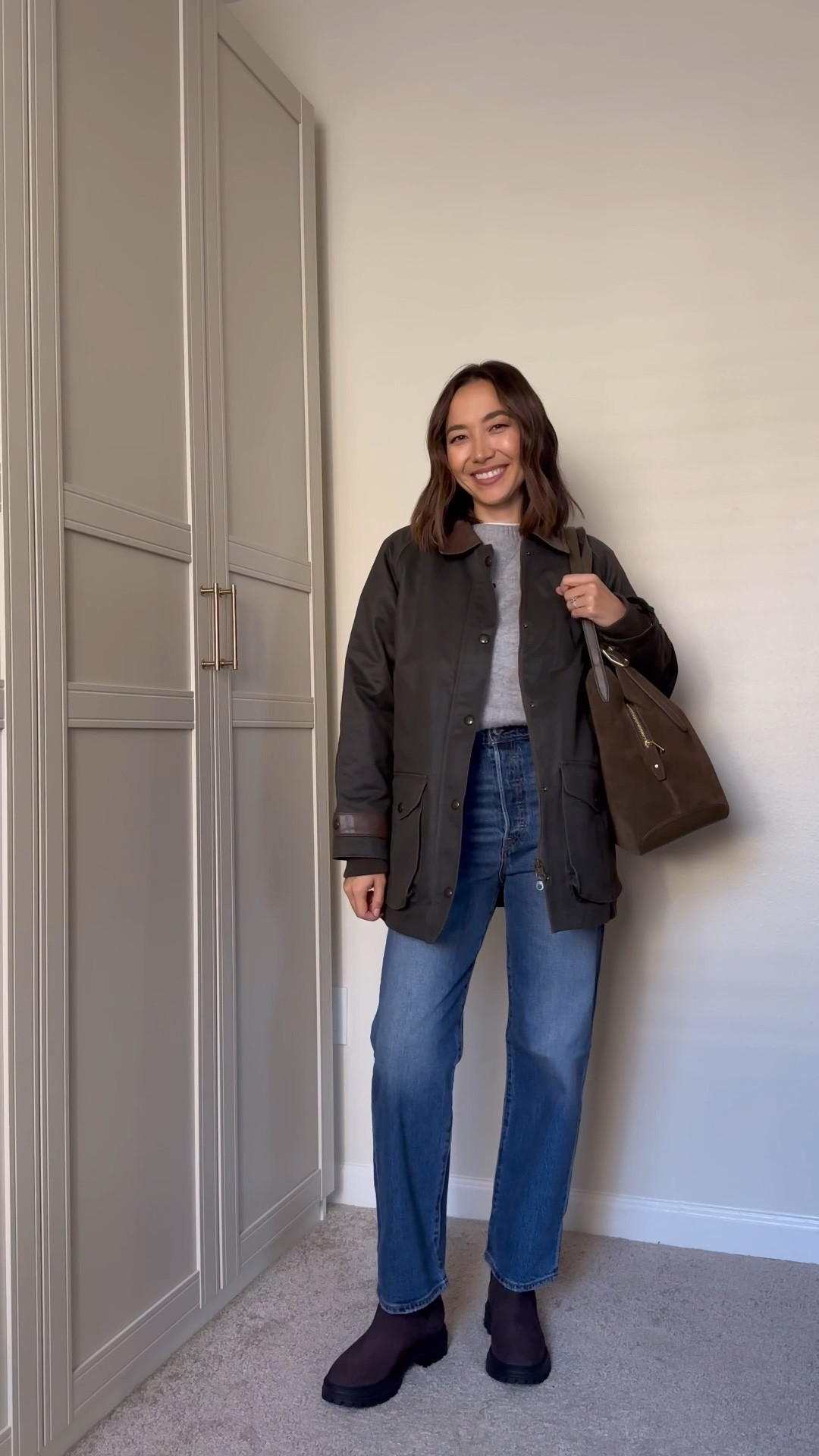 30 days of minima fall outfits 

Jcrew barn jacket 
Everlane cashmere sweater 
Levi’s ribcage ankle jeans 
Cole haan boots — old, linked to similar styles 
Kate spade tote 

#LTKStyleTip #LTKSeasonal