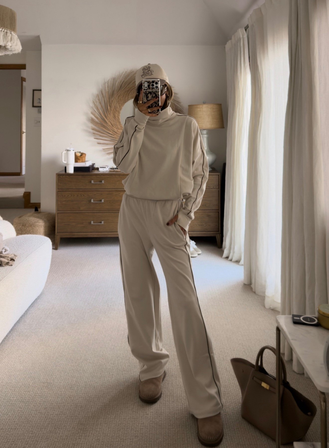 Elevated athleisure wear size small on mock neck sweatshirt and pants 
Ugh booties  
Perfect as a travel outfit 

#LTKTravel #LTKActive #LTKSeasonal