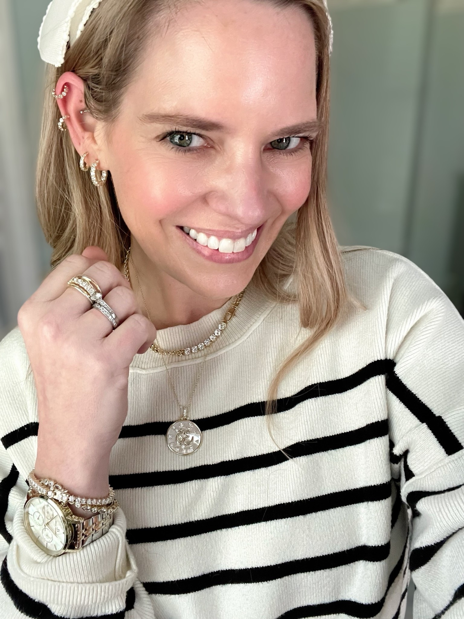 Use code ASHLEYBA for 10% off all Melinda Maria jewelry + FREE 1” Diamondette Hoops with purchase through 4/15! ✨💎

This classic-meets-coastal outfit is all about comfort, polish, and a touch of sparkle 🖤🤍🌊. I’m wearing a lightweight striped sweater, wide-leg denim with a drawstring waist, and the ultimate spring accessories — including a bow headband, leopard heels for a pop of print, and Melinda Maria favorites that elevate it all ✨👜

Melinda Maria Jewelry Details:
	•	Coin pendant necklace with celestial sparkle 🌙✨
	•	Tennis choker layered for just the right amount of glam 💫
	•	Stacked rings in gold + diamondette for that “collected over time” look 💍
	•	Tennis bracelets on repeat — classic, polished, and versatile
	•	1” Diamondette Hoops — FREE GWP through 4/15!

Styled with an engraved Abbott Lyon watch, a beaded Coach camera bag, and playful layers that keep the look cool, coastal, and put together for errands, brunch, or travel days.

wide leg jeans outfit spring, classic striped sweater look, elevated casual outfit 2025, coastal chic spring fashion, Melinda Maria coupon code, free gift with purchase jewelry, everyday jewelry stack, tennis bracelet layered look, Coach camera bag with beaded strap, leopard heels outfit, casual glam outfit idea

#LTKFindsUnder50 #LTKFindsUnder100 #LTKOver40