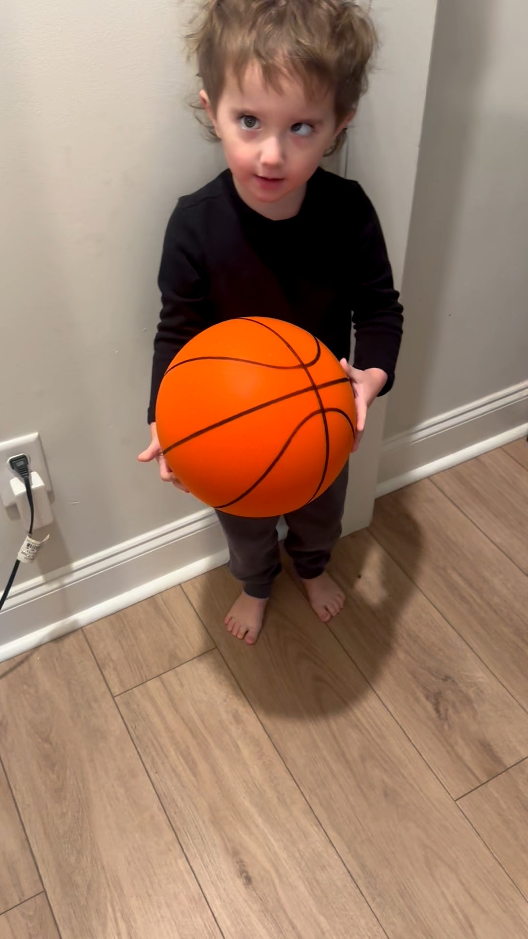 Mikey got this basketball for his birthday from his Aunt Amber. It’s a foam ball that dribbles quietly 