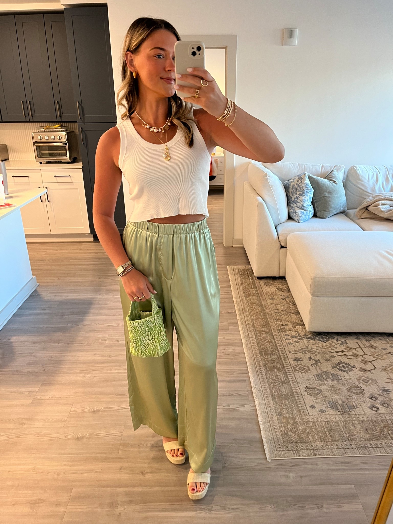 Such a summer staple outfit! Linking similar tanks, satin pants, and purses since the same ones aren’t available!

#LTKStyleTip #LTKSeasonal #LTKItBag