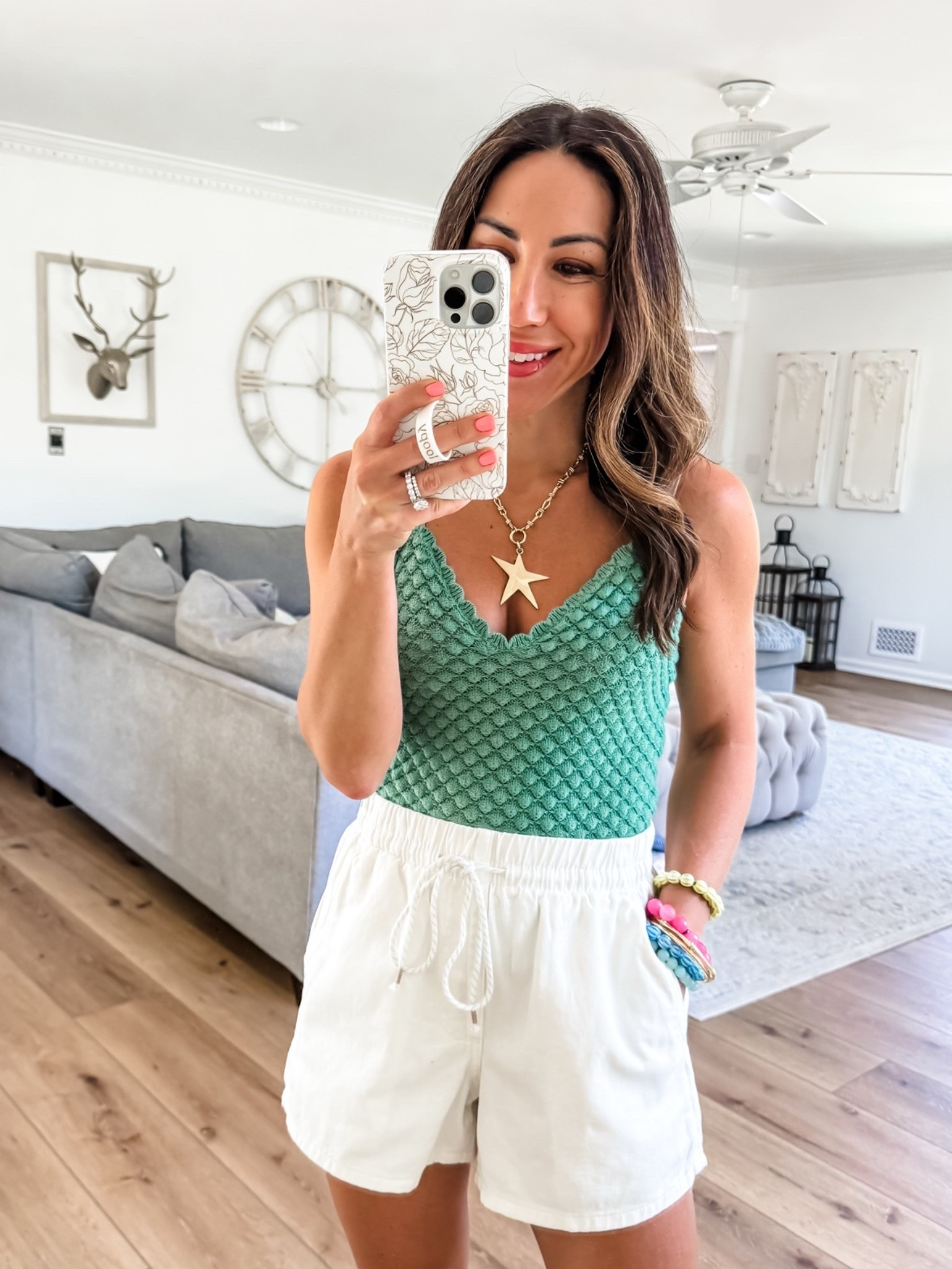 Small white denim shorts. Green tank small. Target style.

#LTKOver40