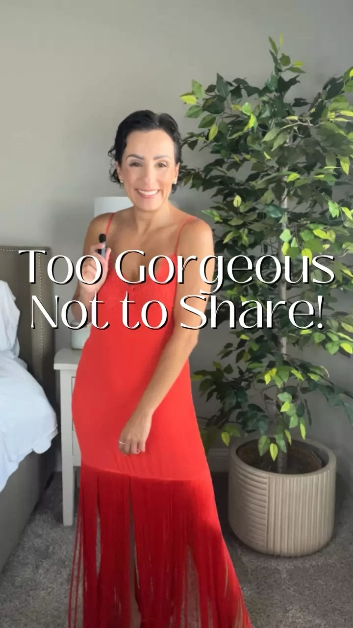 Plans may have changed, but this J.Crew dress still deserves its moment! 🌺 This stunning reddish-orange fringe slip dress features intricate lace embellishments up top and a swingy, floor-sweeping fringe trim. It was meant for a vacation, but I couldn't resist sharing it with you all. Even though the trip is off, the style is still on point! ✨

#LTKStyleTip #LTKTravel #LTKVideo