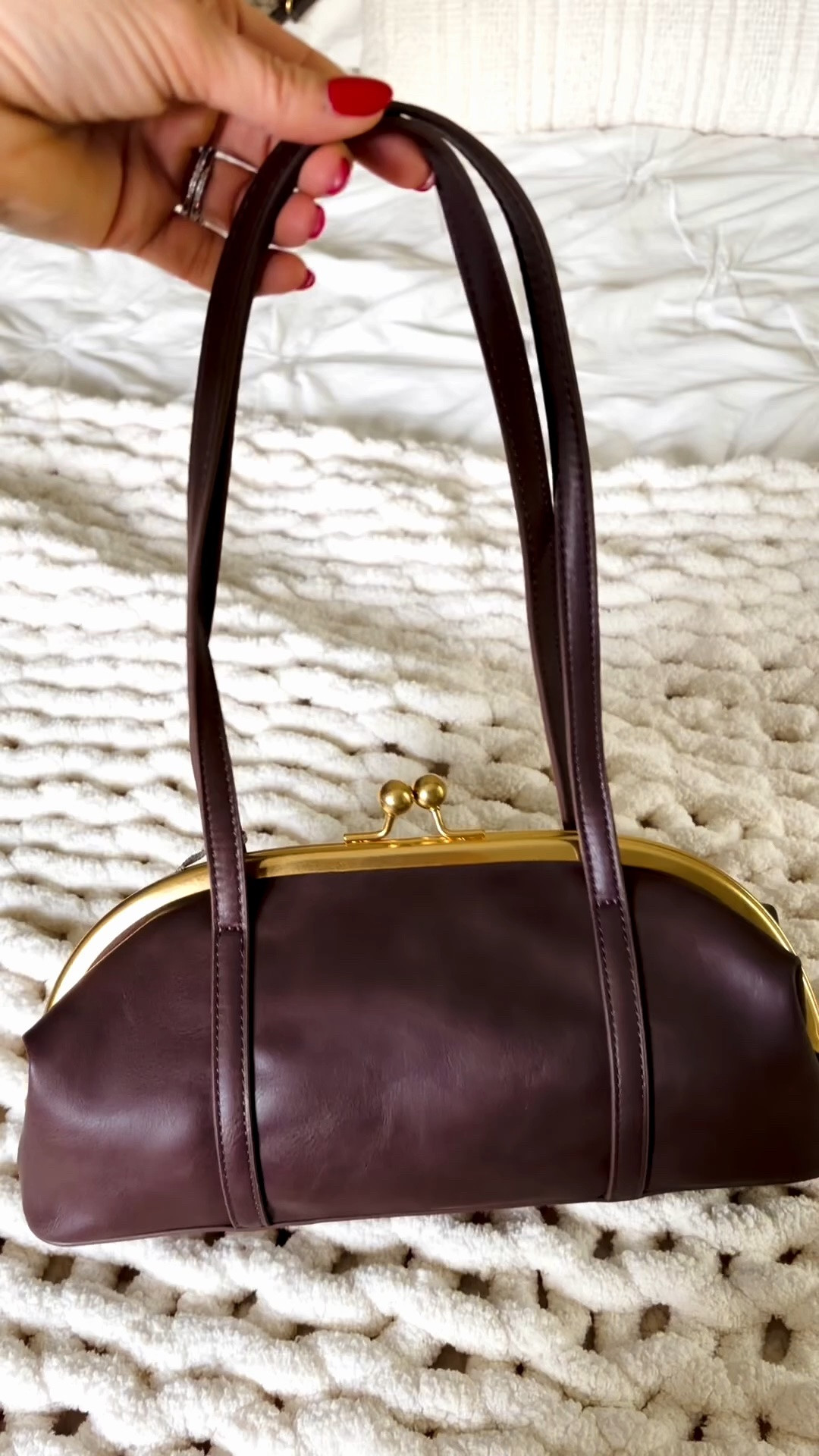 Can you guess wear this fall brown bag is from?  It is a coin purse style bag and looks $$$ but it is not.

#LTKSaleAlert