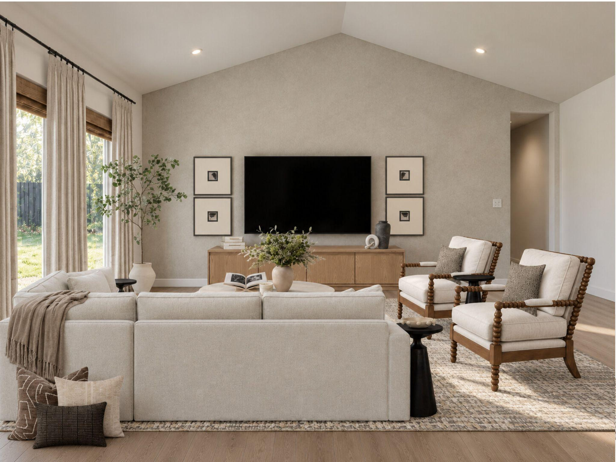 The art of making a TV feel like part of the design ✨ A warm wood console, thoughtfully styled accents, and simple framed art bring balance to this living room without the need for a bulky entertainment center. Neutral, intentional, and effortlessly cozy. 🤎 

 