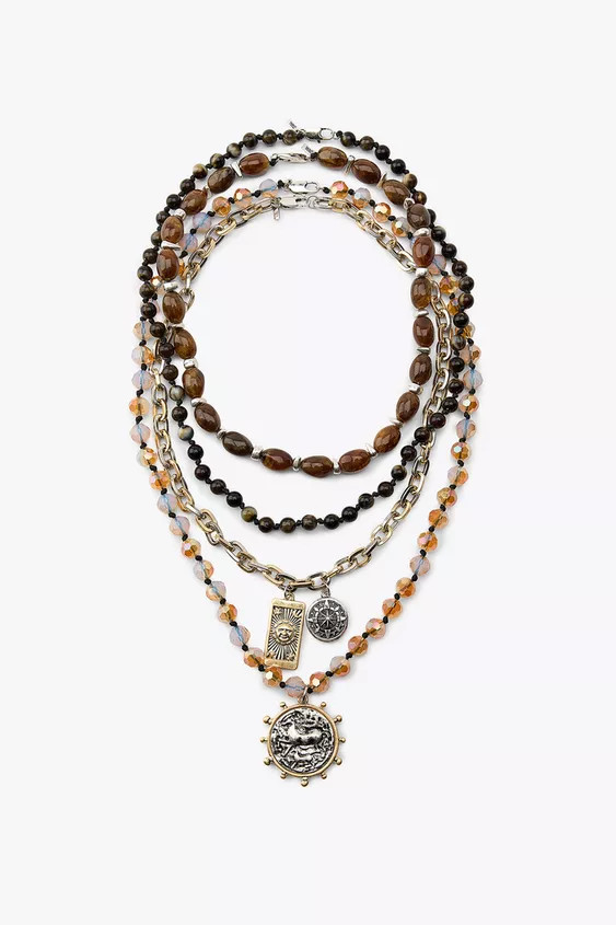 Pack of four necklaces in different lengths:- Necklace combining colored oval pieces and metal pi... | Zara US