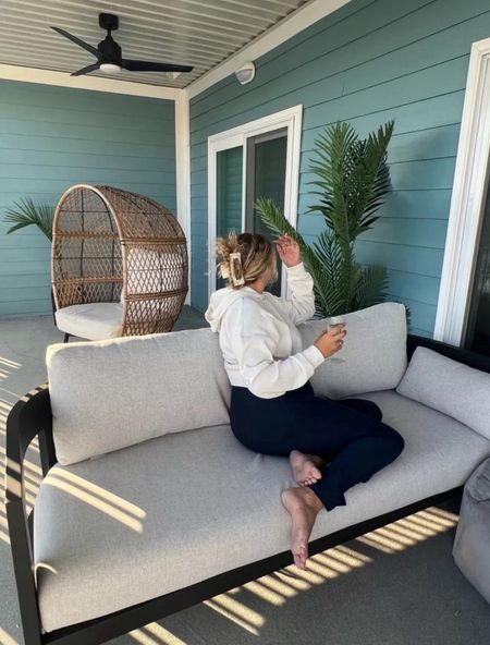 This patio might be my favorite place! Patio furniture, outdoor furniture, casual outfit, loungewear, alo yoga, beyond yoga, costa farms, outdoor plants, patio couch, patio chair, wicker outdoor chair

#LTKSeasonal #LTKHome #LTKFamily