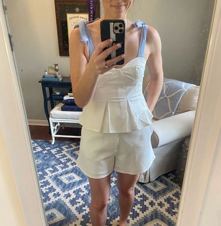 The cutest set from Tuckernuck! Will definitely be packing it to wear together for my bachelorette weekend at the lake, but the pieces individually make great separates. 

The shorts are lined and do not hug your thighs 🙌🏻 I got them in a medium and love the pique material and zipper front. I typically wear a 26 or 27 in jeans but have a bottom to account for and am very happy to have sized up to a medium because they fit perfectly!

Y’all know I love a tie shoulder detail and that coupled with pleating on this tank makes for a really cute look! I’m in an extra small in the top which works great thanks to elastic around the back. 

If you’re shopping Tuckernuck be sure to use the code YOUROCK for 20% off! 

#LTKunder100 #LTKSeasonal #LTKunder50