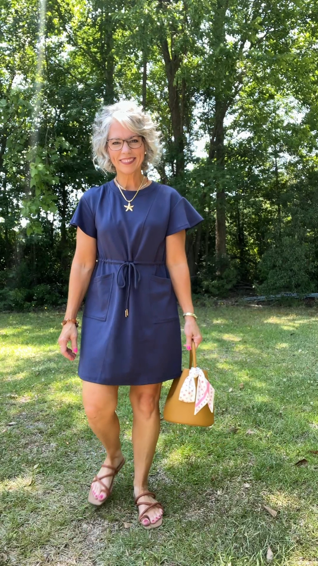 Saturday ootd and this navy blue knit dress from Amazon is everything, a flattering drawstring tie waist, patch pockets, slight flutter short sleeves, and it hits just above the knee for the cutest mini length that works on petites so well! I styled it with a gold starfish necklace, a colorful beaded necklace, a brown neutral bracelet, gold huggie hoop earrings, and brown toe ring strap sandals from Fitory and this whole look just came together so perfectly. Everything is from Amazon. 

#amazonfashion #amazonfinds #amazonstyle #founditonamazon #amazondress #amazonoutfit #amazonjewelry #amazonsandals #summerstyle #summeroutfit #summerfashion #summerinspo #summervibes #summerlook #summerwear #summerdress #casualoutfit #casualstyle #casualchic #effortlessstyle #effortlessfashion #ootd #ootdfashion #outfitoftheday #outfitinspo #outfitideas #realoutfitgram #todaysoutfit #affordablefashion #affordablestyle #budgetfashion #womensfashion #womensstyle #petitestyle #petitefashion #petiteoutfit #petitewomen #petitegirl #petites #momstyle #momfashion #momootd #momlife #teacherstyle #teacherfashion #grandmastyle #grandmafashion #over40style #over40fashion #over40andfabulous #fashionover40 #womenover40 #over50style #over50fashion #fashionover50 #agelessstyle #midlife #midlifestyle #midlifefashion #maturestyle #maturefashion #fashionblogger #fashionista #styleinspo #fashioninspo #instafashion #cuteoutfit #trending #fashion #style #ltkfinds #ltkseasonal #ltkunder50 #ltkpetite #ltkover40 #ltkover50 #ltkfashion #ltkstyle #ltksummer #ltkspring #liketoknowit #shopltk #navydress #knitdress #minidress #drawstringwaist #patchpockets #fluttersleeve #saturdayootd #goldjewelry #starfishnecklace #beadednecklace #huggieearrings #toering #strapsandals #fitory #coastalstyle #coastalvibes

#LTKootd #LTKPetite #LTKmomlife