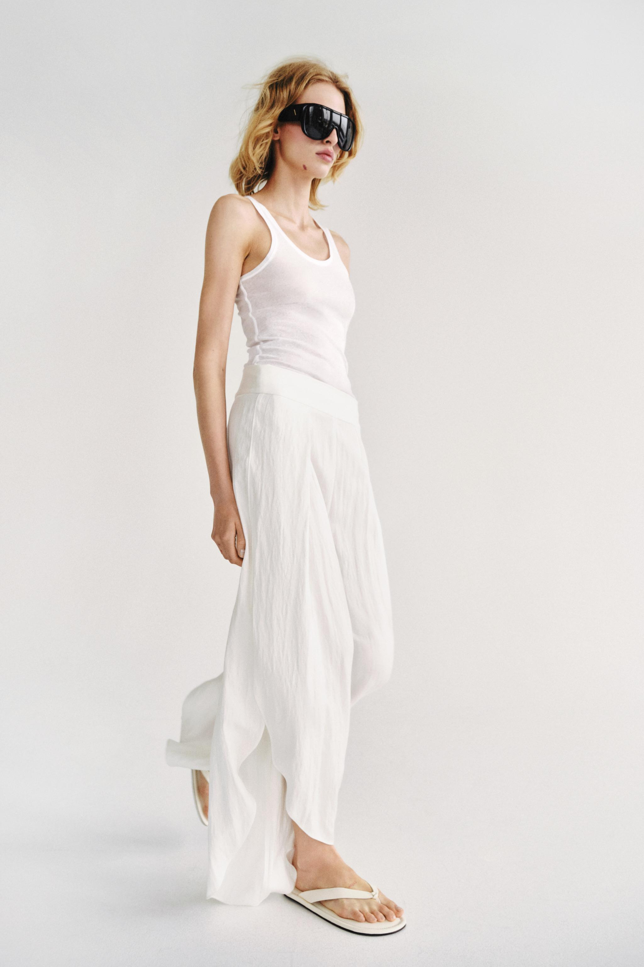 ZARA WOMAN COLLECTIONMid-rise pants with main fabric made from viscose yarn. Front dart detail. W... | Zara US