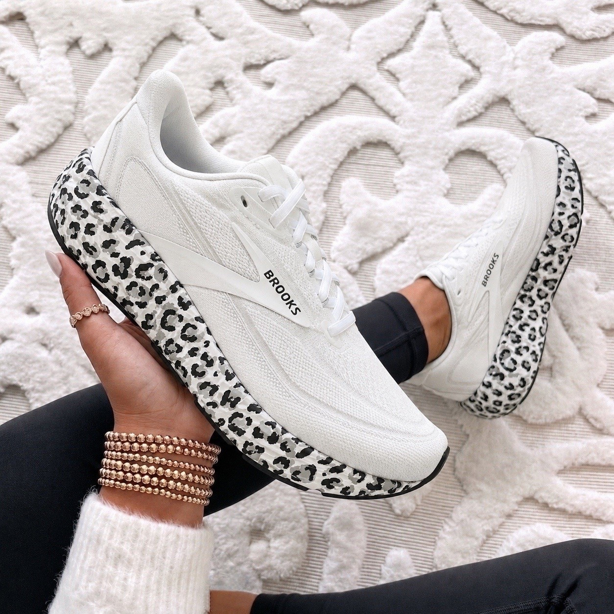 The cutest everyday sneaker just got even better. 🤍 The Brooks Revel 9 in the white leopard colorway. They’re lightweight, super comfortable, and cute enough to wear with leggings, denim, or your favorite athleisure sets.

Fit: They run true to size with a comfortable, secure fit. The cushioned feel makes them great for all day wear, whether you’re running errands, heading to the parks, or getting your steps in. If you’re between sizes or prefer a roomier toe box, consider going up a half size.