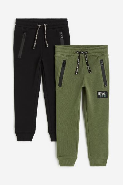 2-pack Joggers - Black/khaki green - Kids | H&M US | H&M (US + CA)