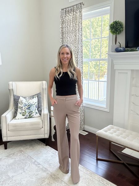 Express Editor high waisted trouser flare plant. I am wearing a size 0 and am 5’4”

Express wide leg pull on pants, express high waisted flare trousers, lulus high waisted ankle pants, express straight leg ankle jeans, dsw sandals, Sami jewels pave gold big hoops #workoutfit #weartowork #express #lulus #samijewels #businesscasual white arm chair floral pillow antelope navy blue pillow tufted ottoman, boxwood topiary black, crop tank top, razor back from Amazon #amazonfashion 

#LTKworkwear #LTKhome #LTKover40