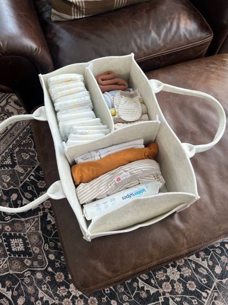 Baby diaper caddy is super easy for carrying around must haves easily - diapers, wipes, swaddles, clean onesies, burp cloths 

#LTKbaby #LTKfamily #LTKbump