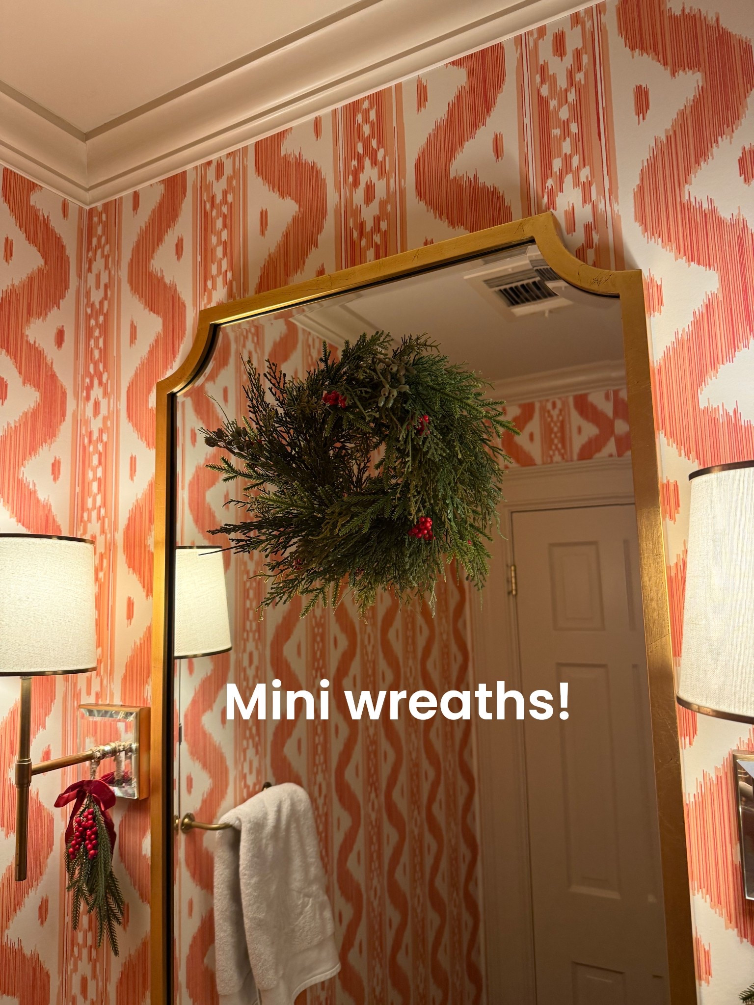 It’s so chic that o hang a mini wreath on your powder bathroom mirror! I used a suction cup with a hook on it 