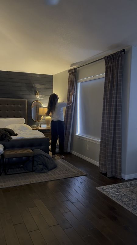 Moody master bedroom inspo. Gorgeous brown area rug. Two pages plaid curtains  

#LTKhome #LTKVideo #LTKstyletip