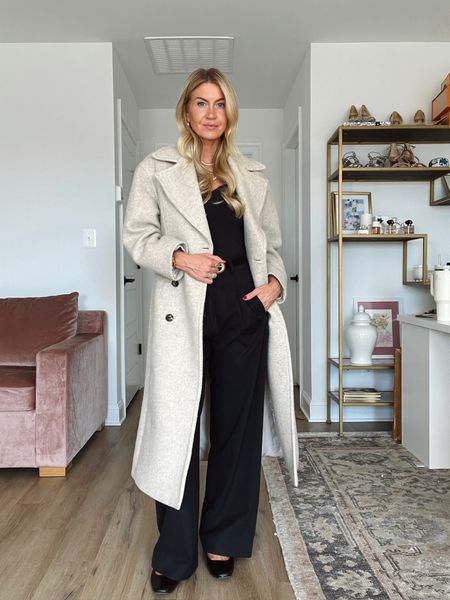 Large wool coat, all black outfit, how to style black trousers 

#LTKstyletip #LTKSeasonal