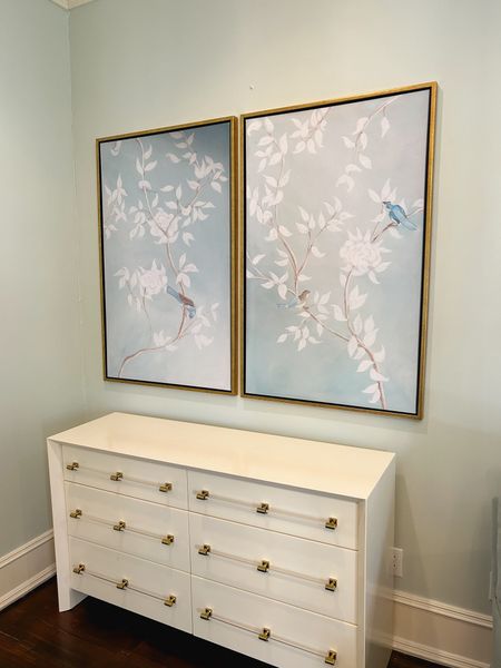 Beautiful white dresser with acrylic knobs

Chinoiserie panel artwork by Mkdeckerdesigns.com 