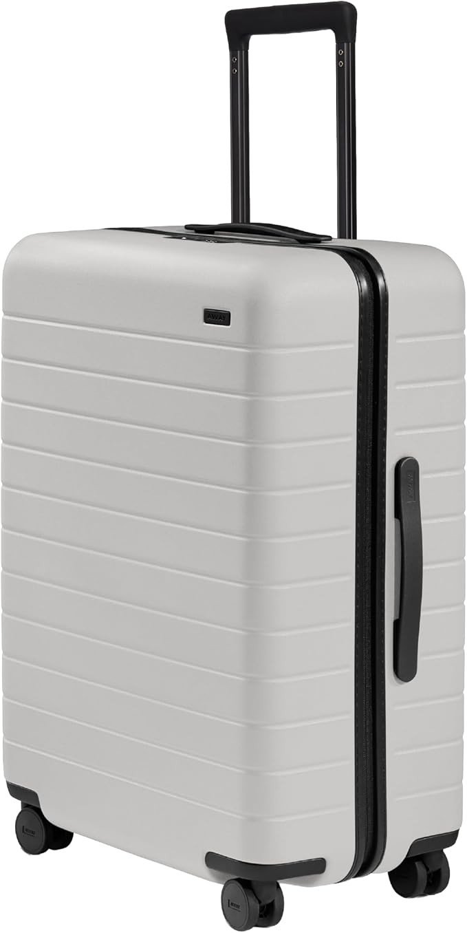 Away Medium Checked Luggage - 26-Inch Lightweight Hardside Suitcase with Custom WhisperGlide 360... | Amazon (US)