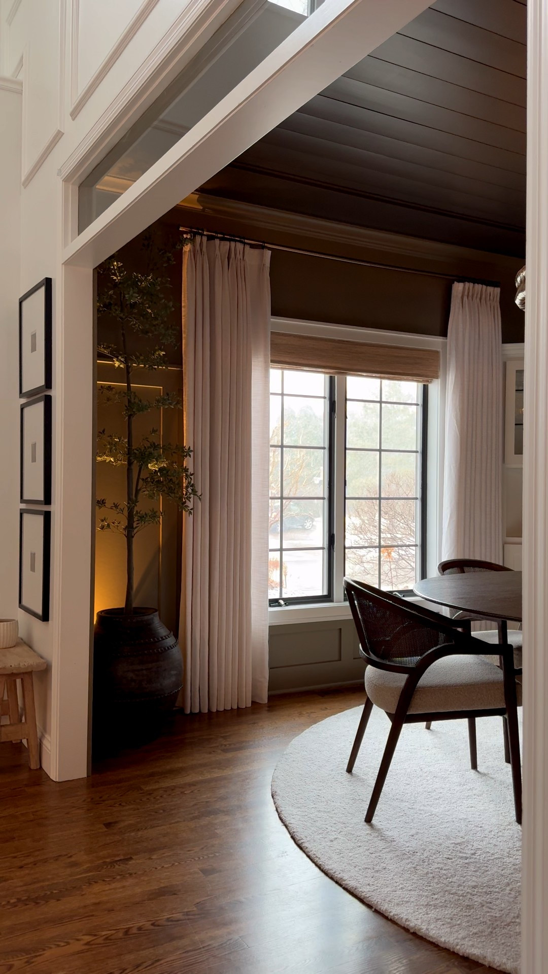Snowy afternoon coziness in the dining room. That uplighting behind the tree is a vibe 😎

#LTKHome #LTKSeasonal #LTKdayinmylife