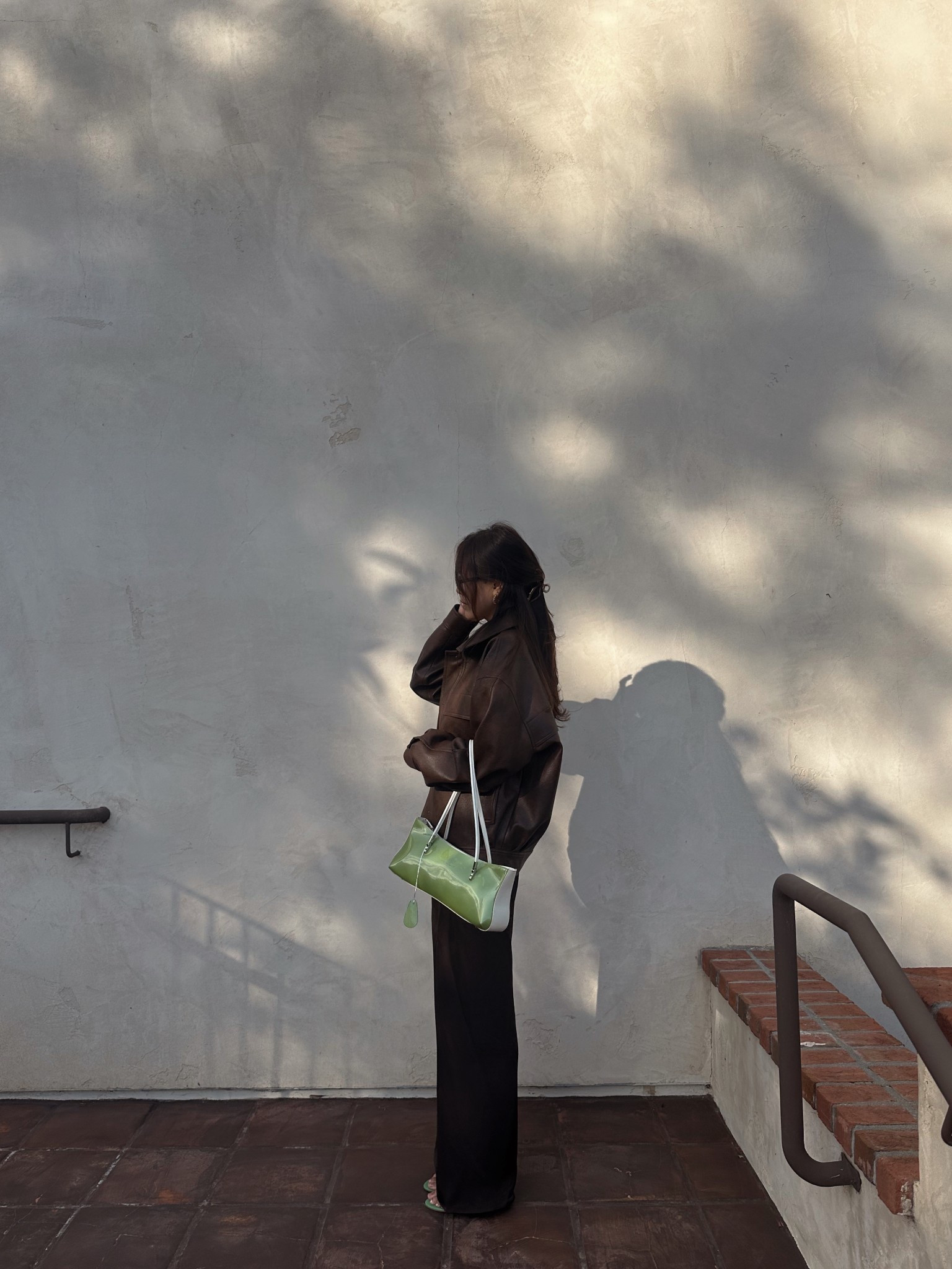 One of my go-to travel outfit looks: satin pants with a leather jacket for that perfect mix of softness and edge. 🤎

#LTKdayinmylife #LTKootd #LTKTravel