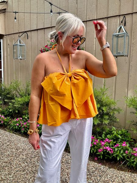 Summer time top from Anthropologie! The cutest bow top! Love the color too. I paired it with my favorite Walmart white pants. I’m in a medium in the top! The pants fit generous. 

Almost 50, over 40 style, summer outfit 

#LTKMidsize #LTKOver40 #LTKStyleTip