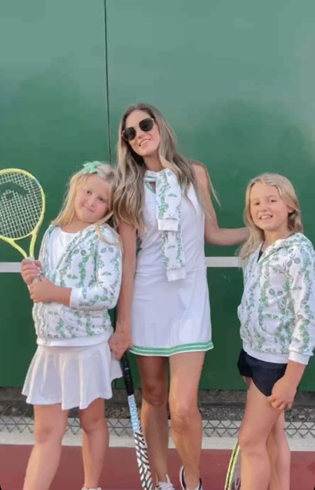 A night on the courts with my girls🤍🎾. Matching mommy and me outfits! @clubandcourt the sweetest bespoke racket and vine hoodie, my white tennis dress, and some laughs under the lights. 

#LTKkids #LTKfamily #LTKfit