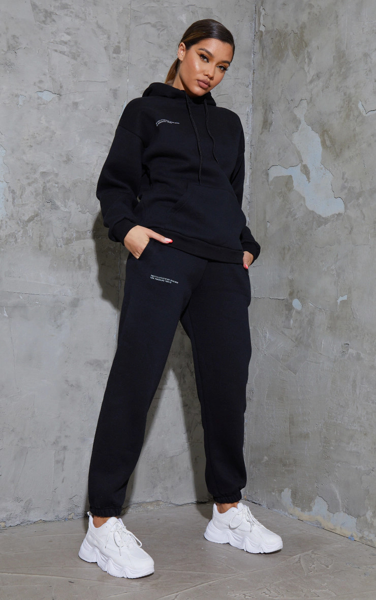 PRETTYLITTLETHING Logo Black Est 2012 Cuffed Sweatpants | PrettyLittleThing US