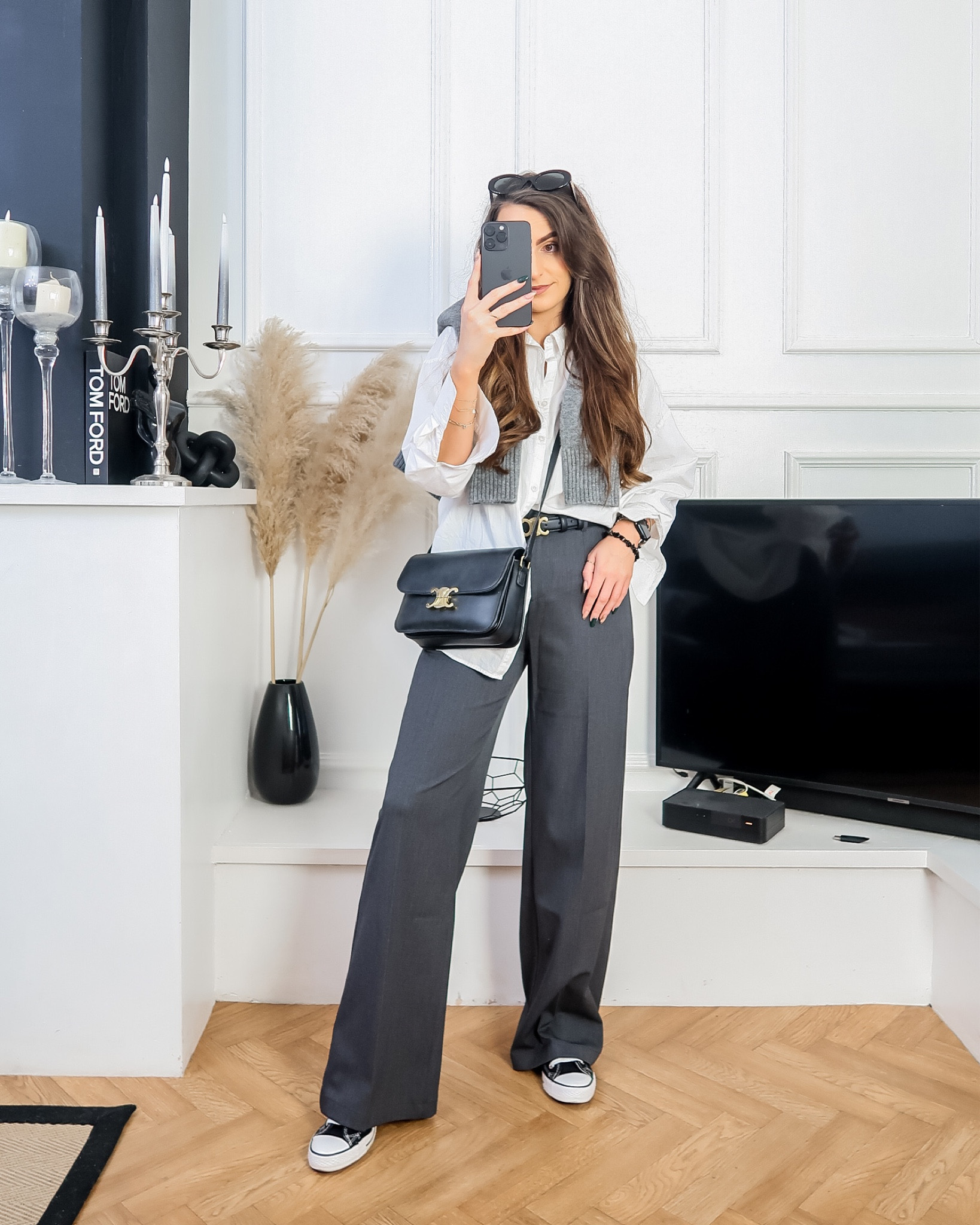 Spring outfit, spring style, spring fashion, white shirt, white oxford shirt, white oversized shirt, grey knit over shoulders, dark grey trousers, bershka trousers, grey trousers, grey flare trousers, converse, converse hi tops, black converse, converse outfit 

#LTKeurope #LTKworkwear #LTKSpringSale