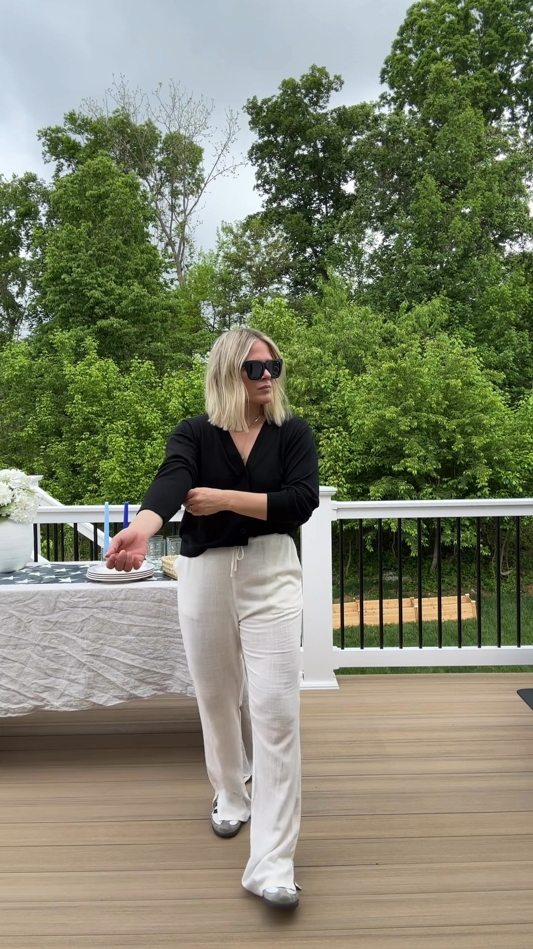 Easy breezy outfit for hosting— comfy pants and a cardigan 🤍 don’t forget your sambas 😘