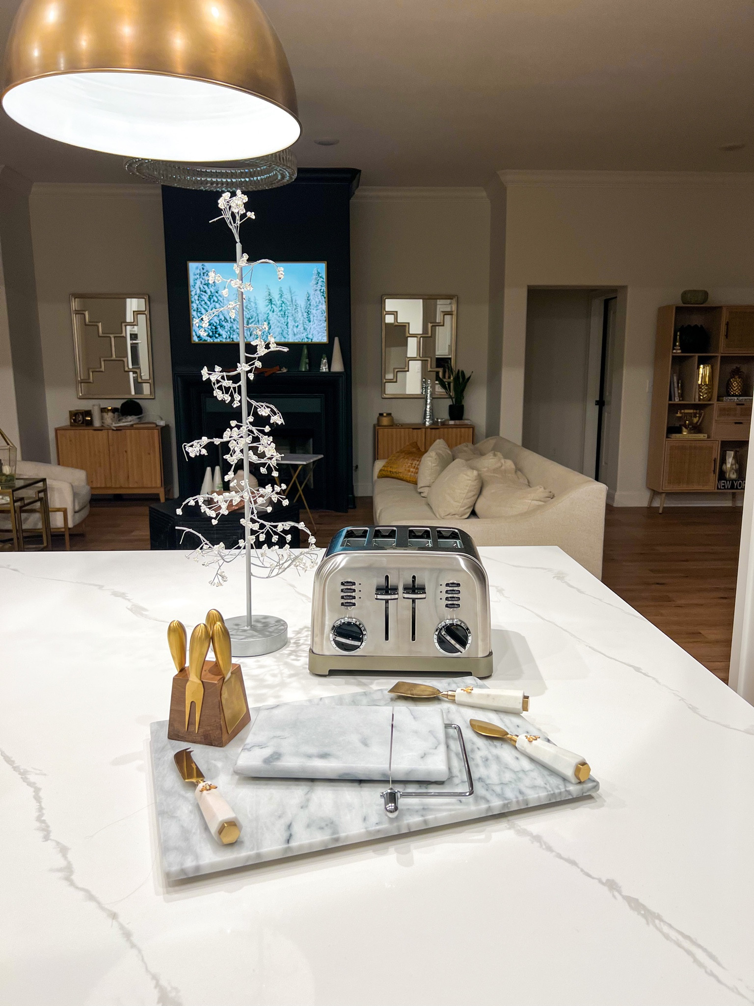 Upgrading to a 4 slice toaster from a 2 was definitely the right call especially with extra company during the holidays. The price point of these items make amazing gifts and home additions. The cheese slicer sitting on top comes with extra slicing wires and has been a game changer when I’m entertaining or having a wine and cheese night in. Charcuterie accessories that are timeless and versatile are my pick! I love all of these. 

#LTKunder100 #LTKHoliday #LTKhome