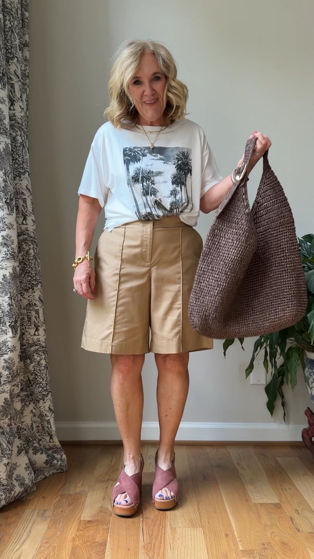 Styling Bermuda shirts graphic tee size medium is def tuck it  I love this white top. Such a sharp look. Size medium 

Shorts size 8 petite linking similar as well 

#LTKOver40 #LTKPetite #LTKTravel