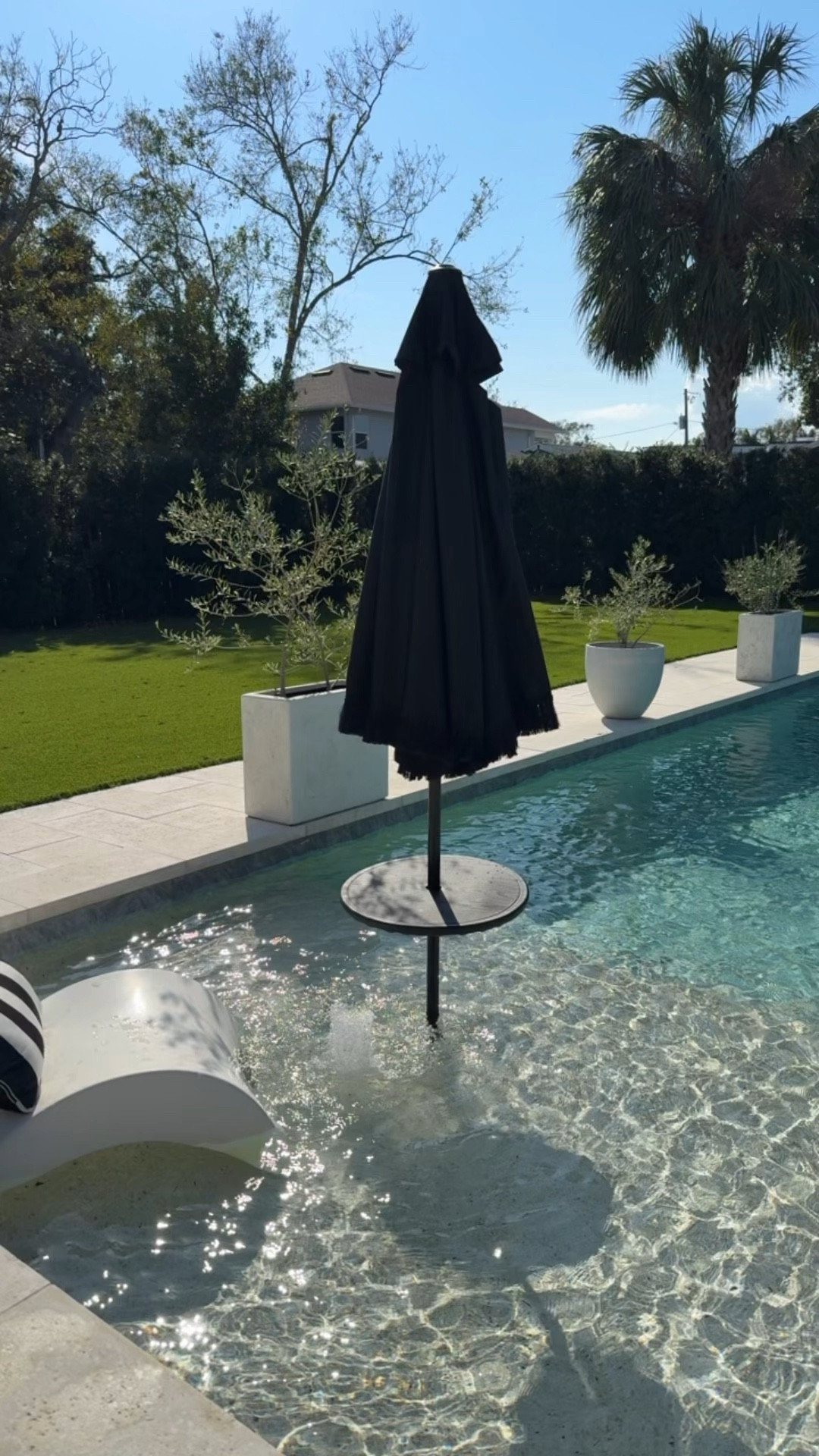 First outdoor update for the upcoming season! Switched out umbrellas and trays from all white to black. 
Comment “tray” for link 🖤

🫶🏼 @new_vision_home 

#outdoor

#LTKSeasonal #LTKHome #LTKSaleAlert