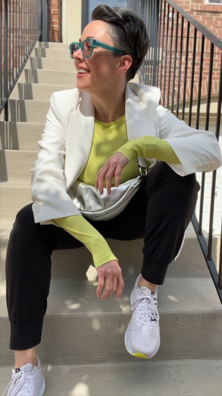 Elevated athleisure 
Taking a pair of my favorite Athleta joggers combined with a neon top and my New Balance sneakers, and leveling them up with a metallic crossbody bag and a white blazer. A quick way to go from sporty to chic!

#LTKOver40 #LTKVideo #LTKActive